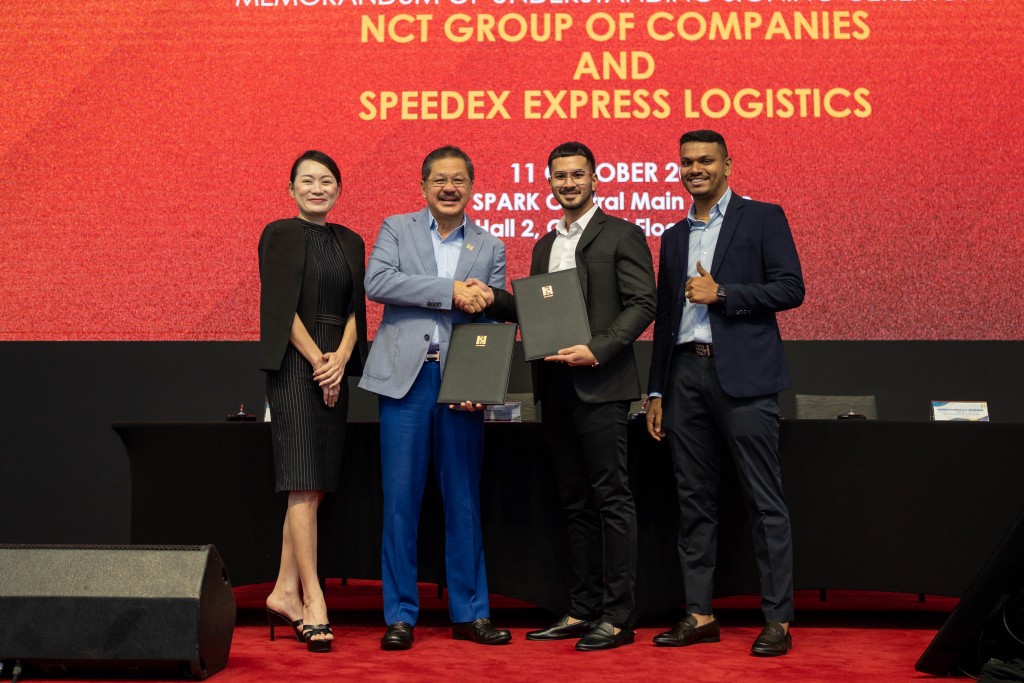 Holding the MoU are Joe (second from left) and Naresh (second from right) while (from left) Neesa and Samraj look on. 